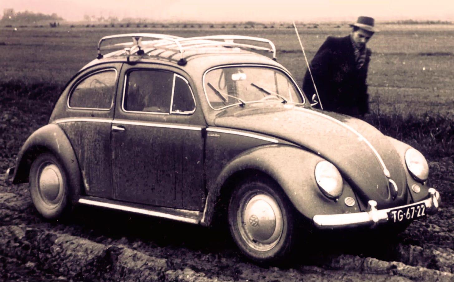 Brother Andrew standing beside his well-known Volkswagen Beetle